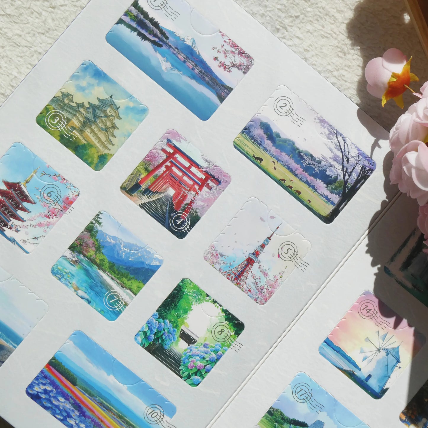 Inside view of the Healing Voyage snack box showing illustrated Japanese destination cards and carefully selected Japanese snacks.