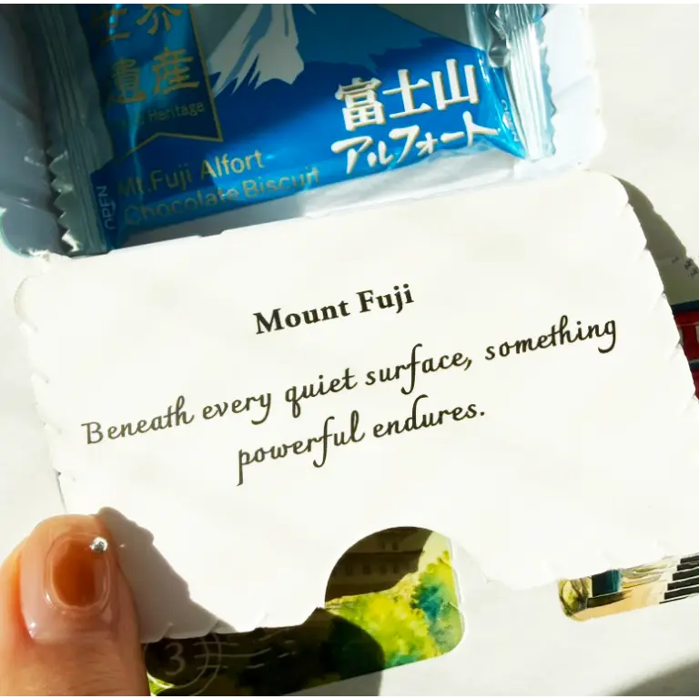 Healing Voyage snack box message card with Japanese snacks, featuring emotional encouragement and comforting words inspired by Japan.